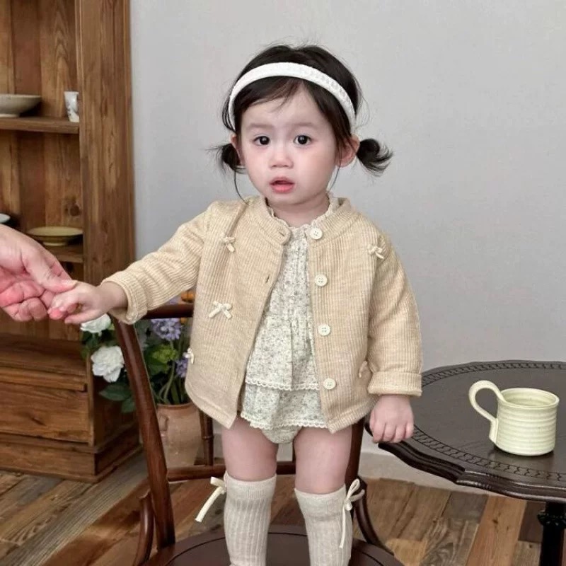 甜美蝴蝶結外套