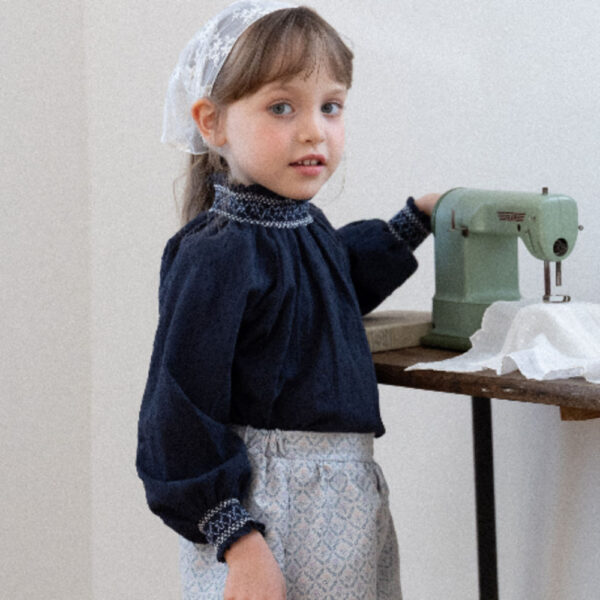 ImageDrain-20260310T024504.545Z 素雅圖騰線條高領上衣