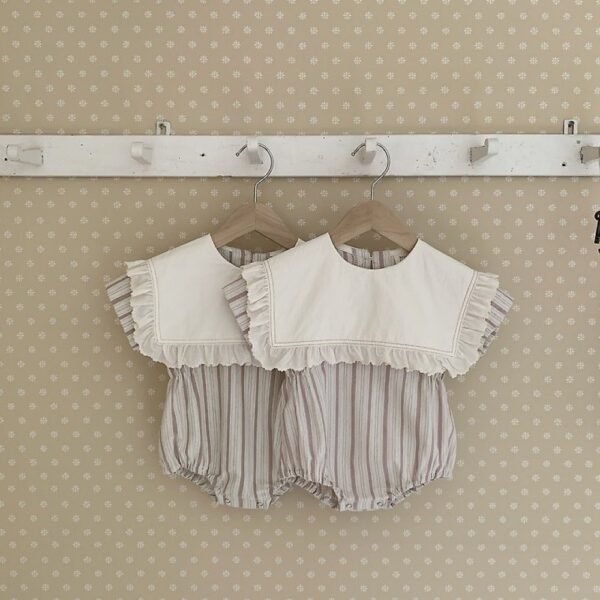 ImageDrain-20260402T020508.295Z 氣質大翻領包屁衣